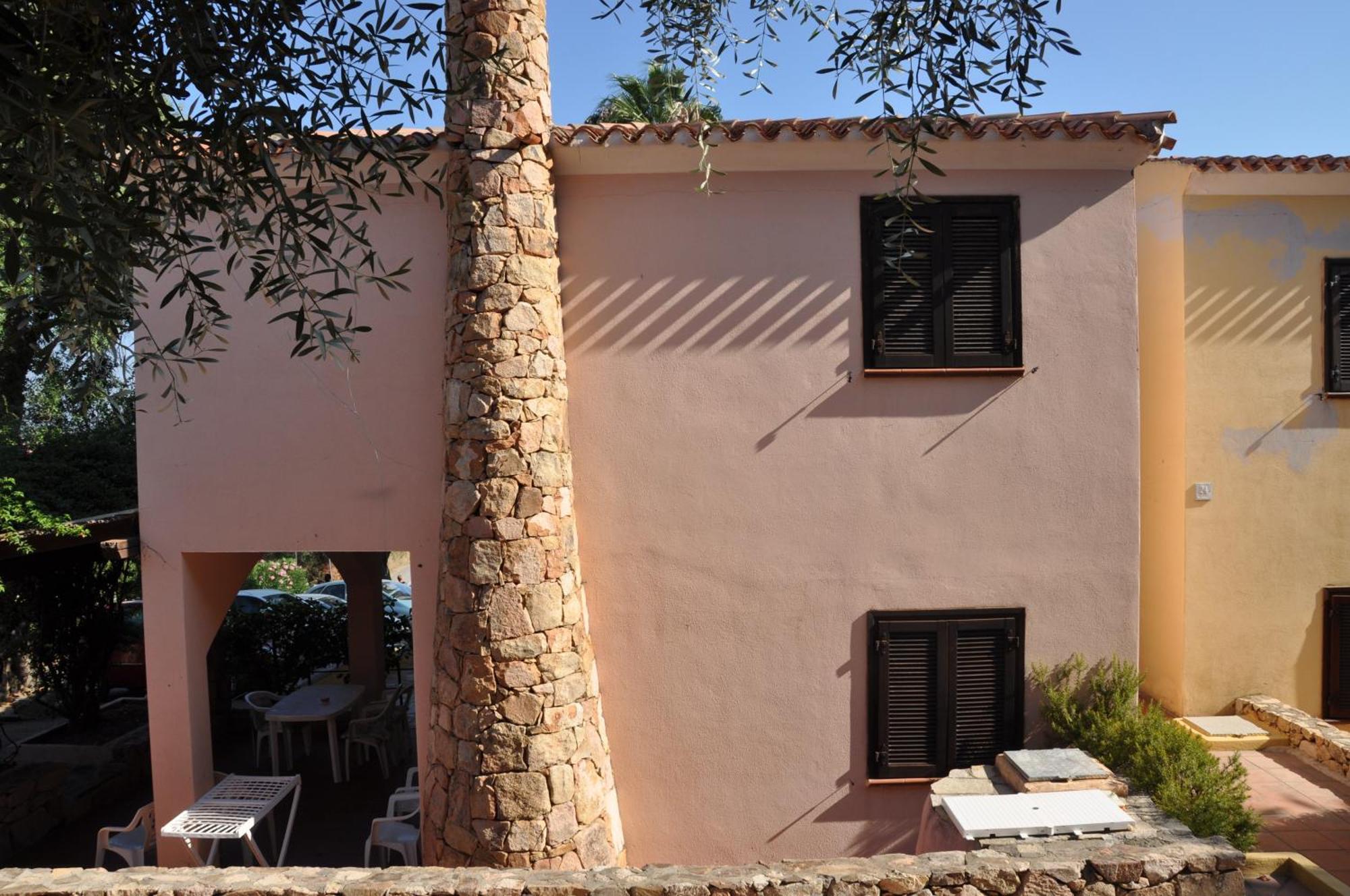 Aparthotel Borgo Le Logge Budoni Habitación foto