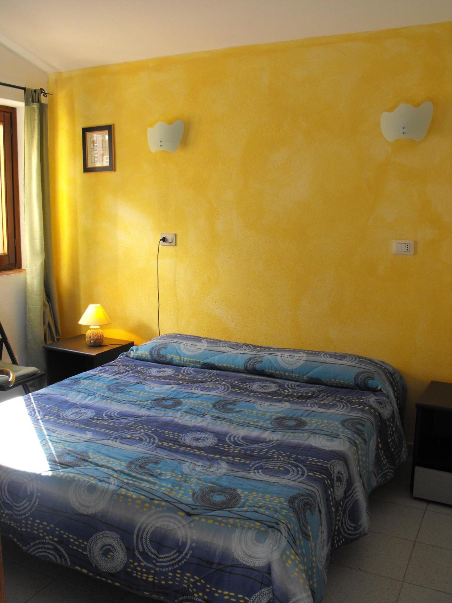 Aparthotel Borgo Le Logge Budoni Habitación foto