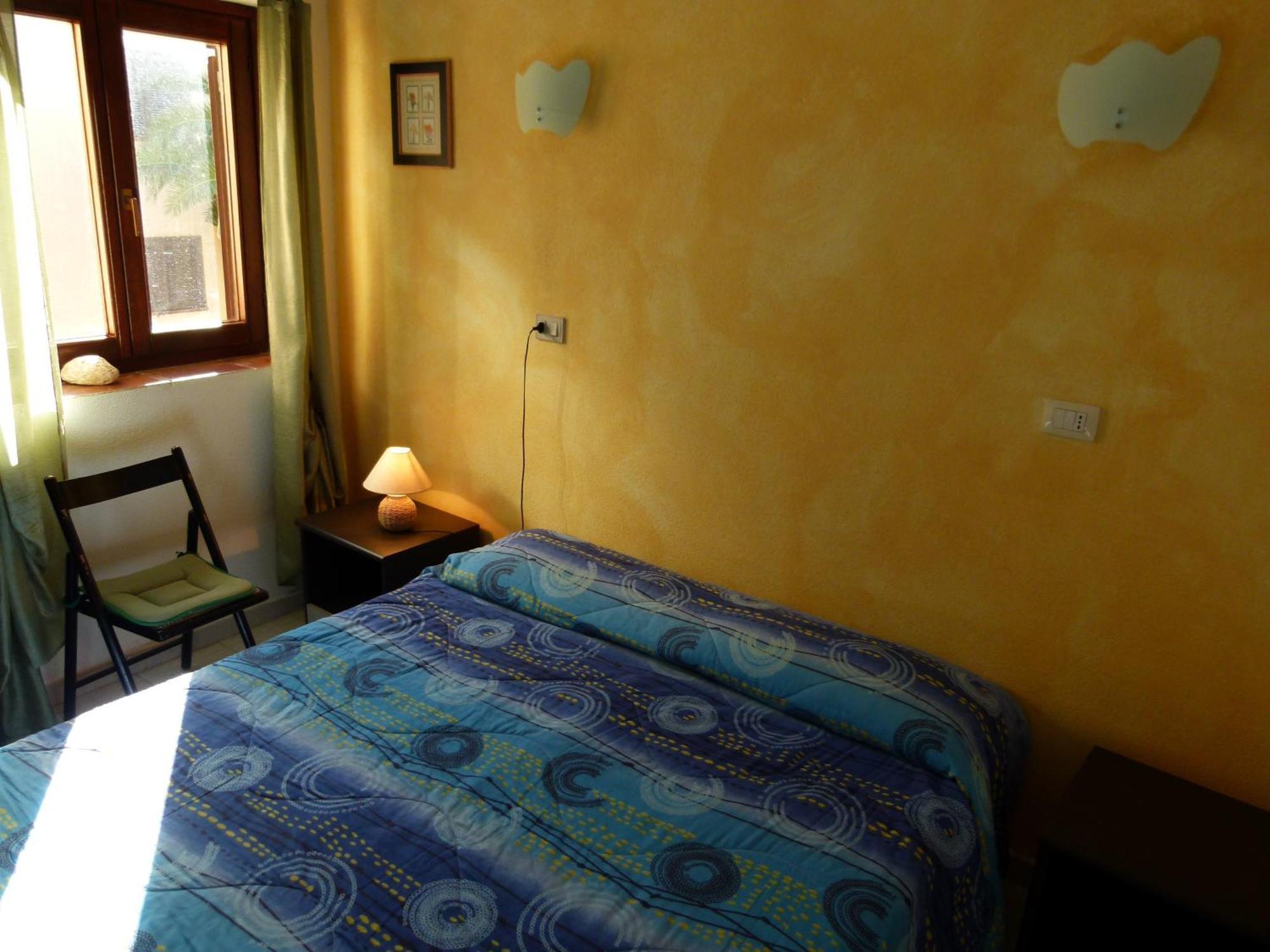 Aparthotel Borgo Le Logge Budoni Habitación foto